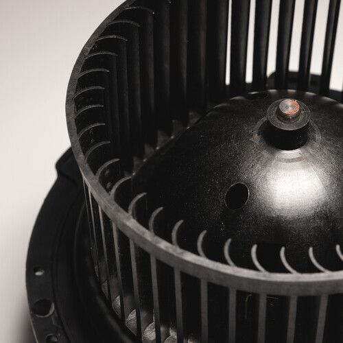 close-up of a black air conditioner blower 