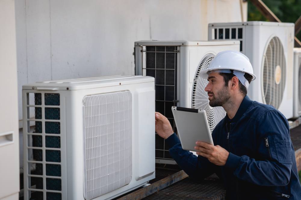 Sub_image_HVAC technician diagnosing system issue