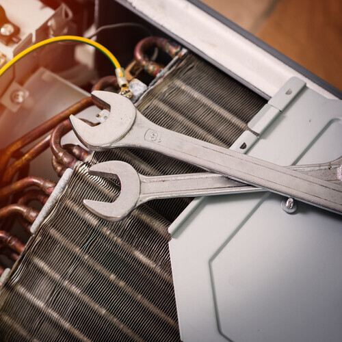 air conditioner equipment being worked on