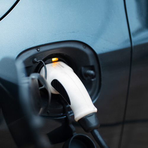 close-up of an electric car being charged
