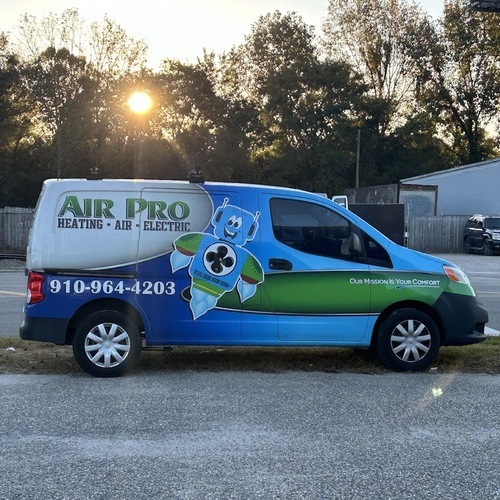 air pro van sitting under a sunset